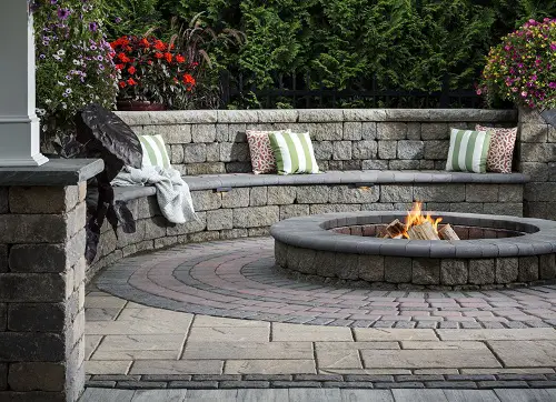 Concrete Wall and Flagstone Patio with Fire Pit