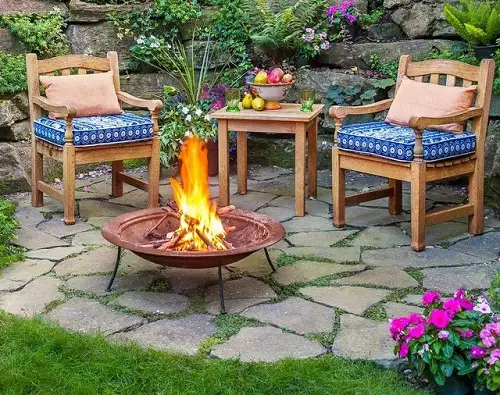 Metail Firepan and Wooden Chairs
