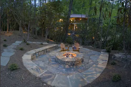 Stone Patio behind Trees