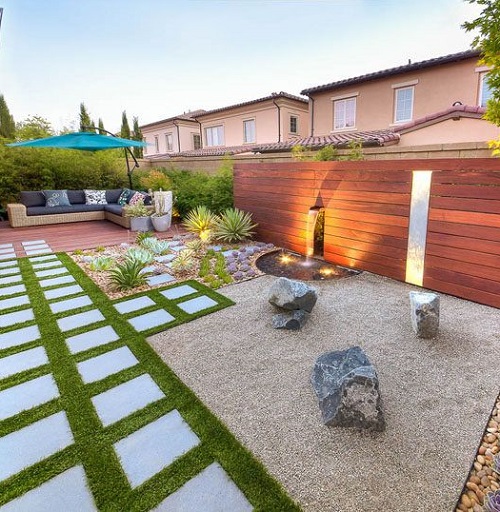 A Lit Up Zen Garden with Patio