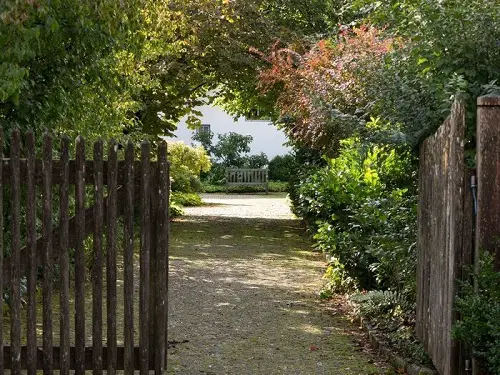 A Wooden Gate and Lamps