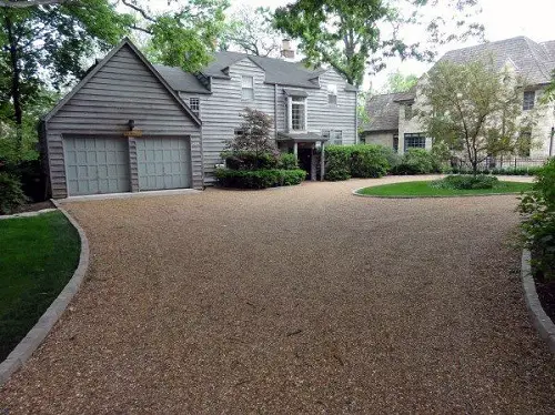 Beige Gravel Driveway with Garage