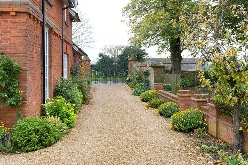 Gravel Driveway and Metal Gate
