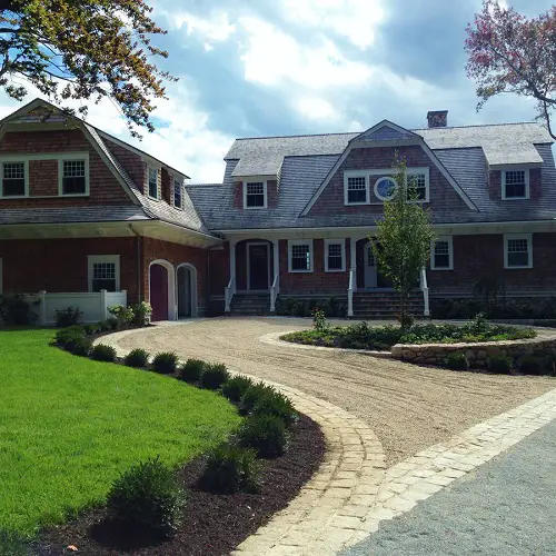 Shrubs Lining the Gravel Driveway