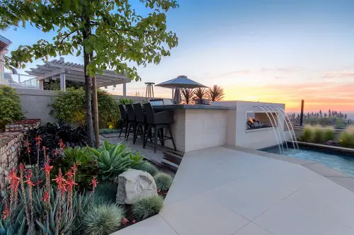 Outdoor Kitchen With Fireplace And Waterfall