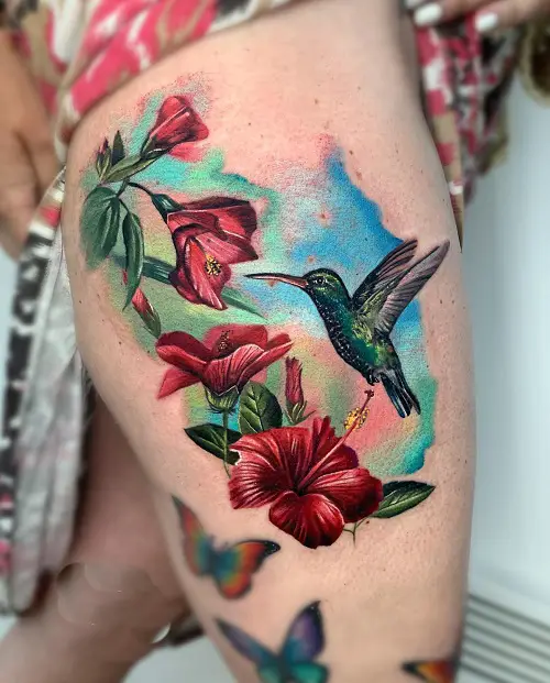 Vibrant Thigh Tattoo Piece tattoo 19