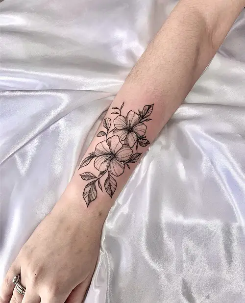 Hibiscus Pair on the Arm tattoo