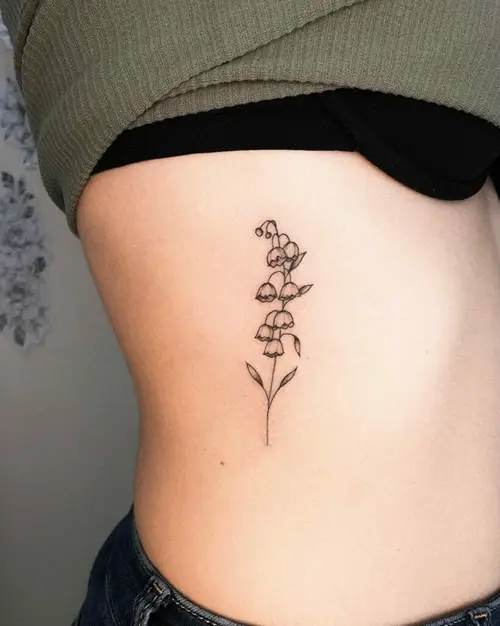 Side Body Art with Lily of the Valley tattoo