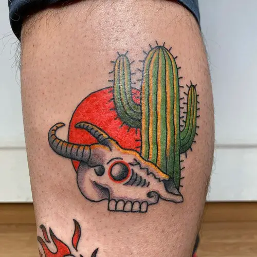 Cow Skull and Cactus at Sunset Tattoo Meaning 9