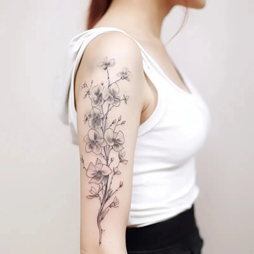 Upper Arm Design Orchid tattoo