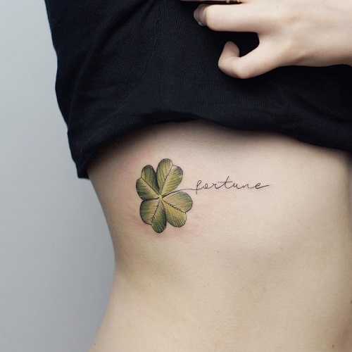 Dull Green Four Leaf Clover with “Fortune” tattoo