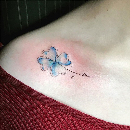 Blue Four Leaf Clover Tattoo on the Collarbone