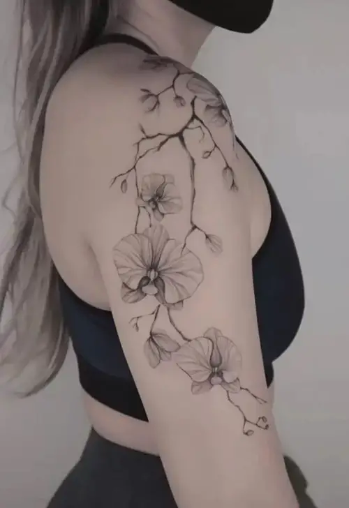 Shoulder and Arm Ink with Orchid tattoo