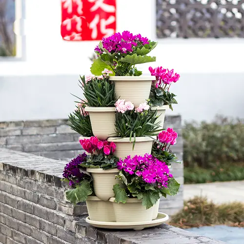  Stackable Planters Grow More Plants on a Windowsill