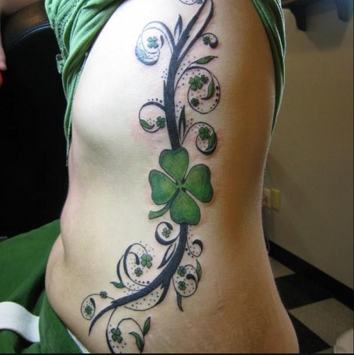 Side Body Tribal Tattoo with Four Leaf Clovers