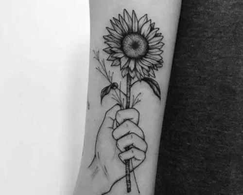 Hand Holding a Sunflower Tattoo 30