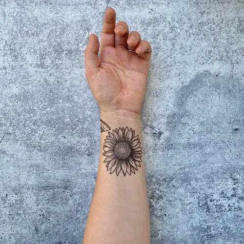 Sunflower on the Wrist Tattoo 13
