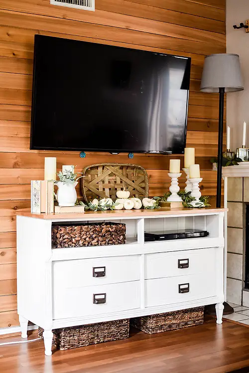 TV Stand with Candles and Books a