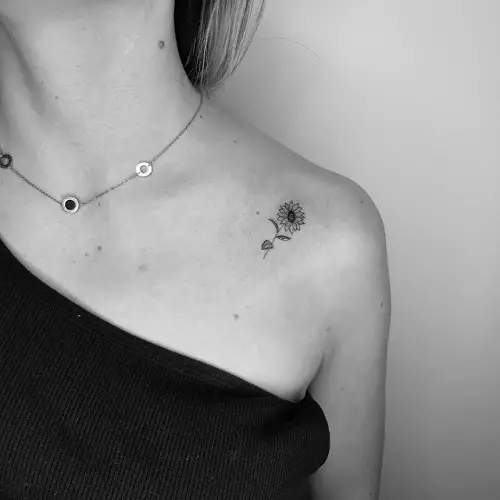 Tiny Sunflower Collar Bone Tattoo