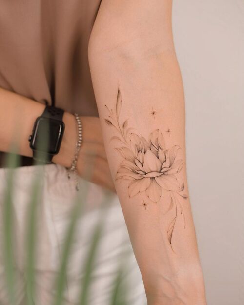 Small Lotus Flower tattoo