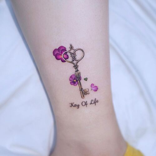 Pansy Flowers with “Key of Life” Tattoo 23