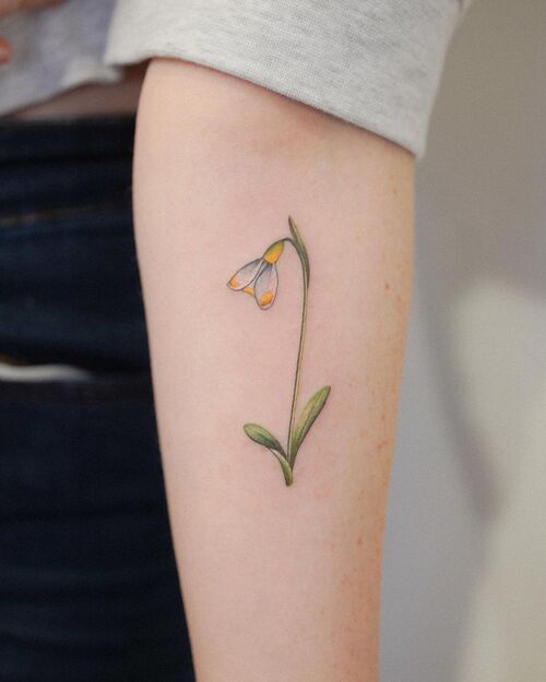 Yellow Snowdrop jaunary birth flower tattoo