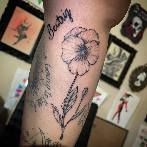 Black and Grey February Flower Tattoo