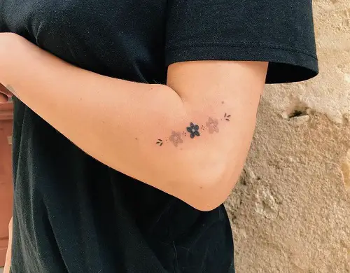 Small A Mini Feminine Design Tattoo 33