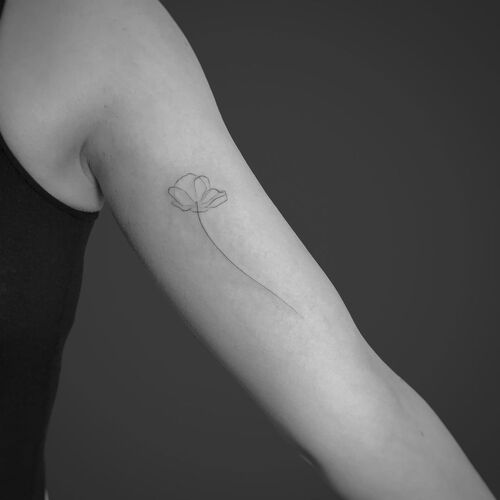 Minimalistic Poppy Flower Tattoo Idea