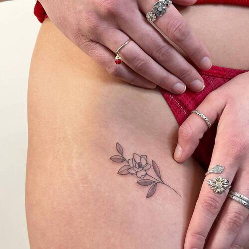 Magnolia flower Bikini Line Tattoo