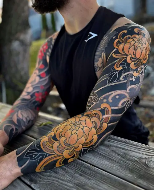 Black and Gold Chrysanthemum Ink tattoo