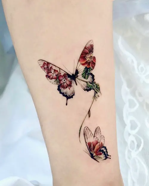 Butterflies with Brown Flowers in the Wings tattoo