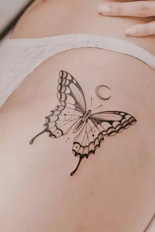 Butterfly and Crescent Moon on Bikini Line Tattoo 11