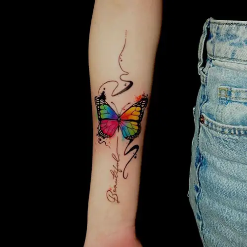 Butterfly in Watercolors with “Beautiful” tattoo