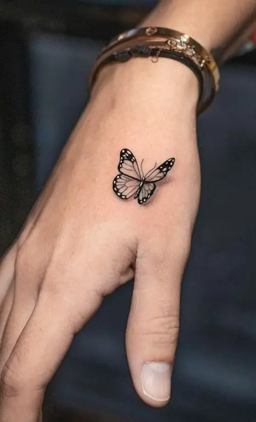 Mini Butterfly Hand Tattoo