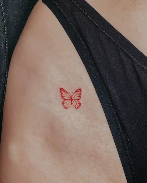Red Ink Butterfly on Bikini Line Tattoo 13