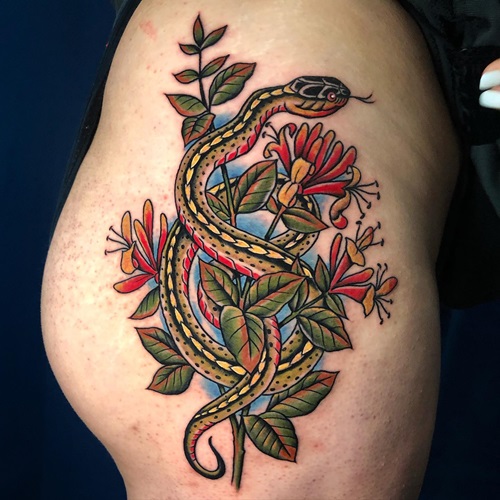 Snake Wrapped Around a Honeysuckle tattoo