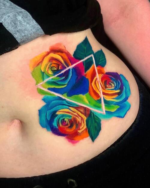 Rainbow Rose Negative Chakra Style tattoo