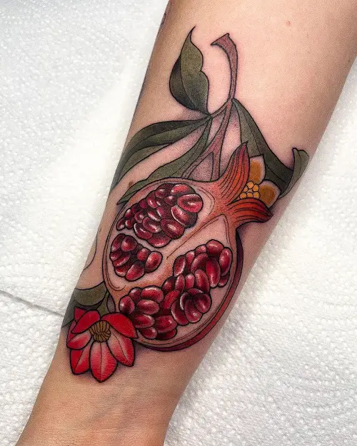 Juicy Pomegranate on the Sleeve Tattoo