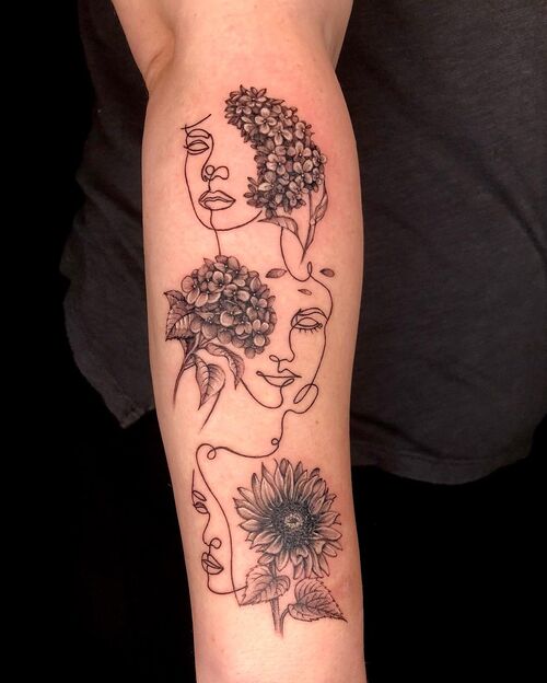 3 Sisters in With Their Favorite Flowers
