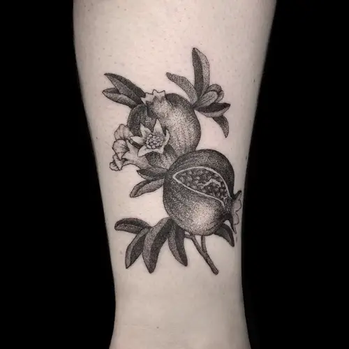 Dotted Pomegranate Piece tattoo