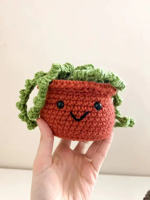Smiley Pot with String of Pearls