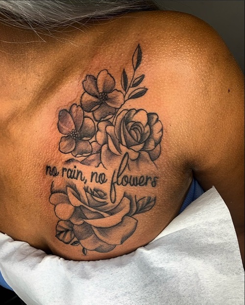 No Rain No Flowers chest Tattoo 17