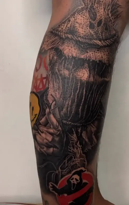 Scarecrow with Smiley tattoo