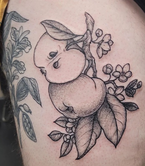 An Apple Branch apple tattoo