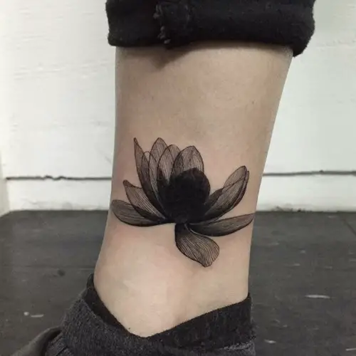 Black Lotus Tattoo on ankle Meaning and Ideas 