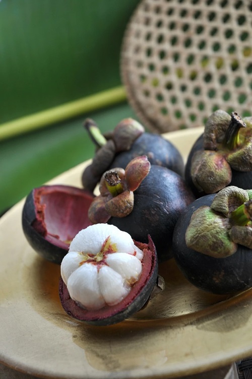 Mangosteen fruits on plate