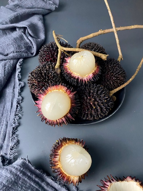 Pulasan fruit in the plate