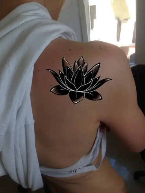 Black Lotus Tattoo on shoulder back side Meaning and Ideas 