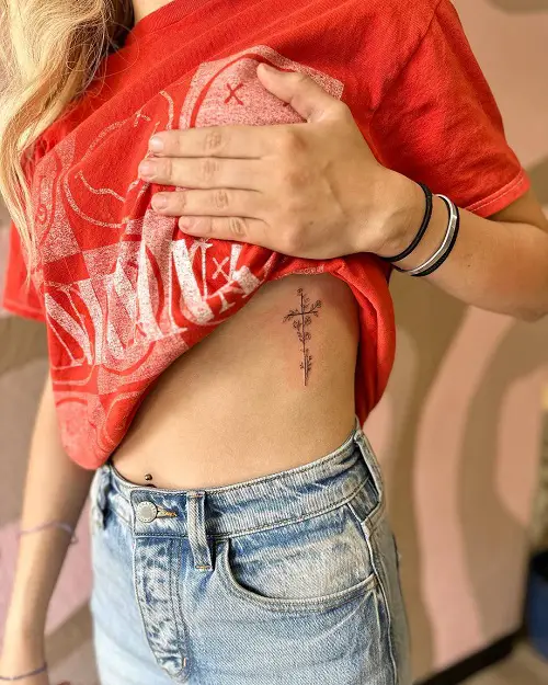 feminine cross with flowers tattoo 3